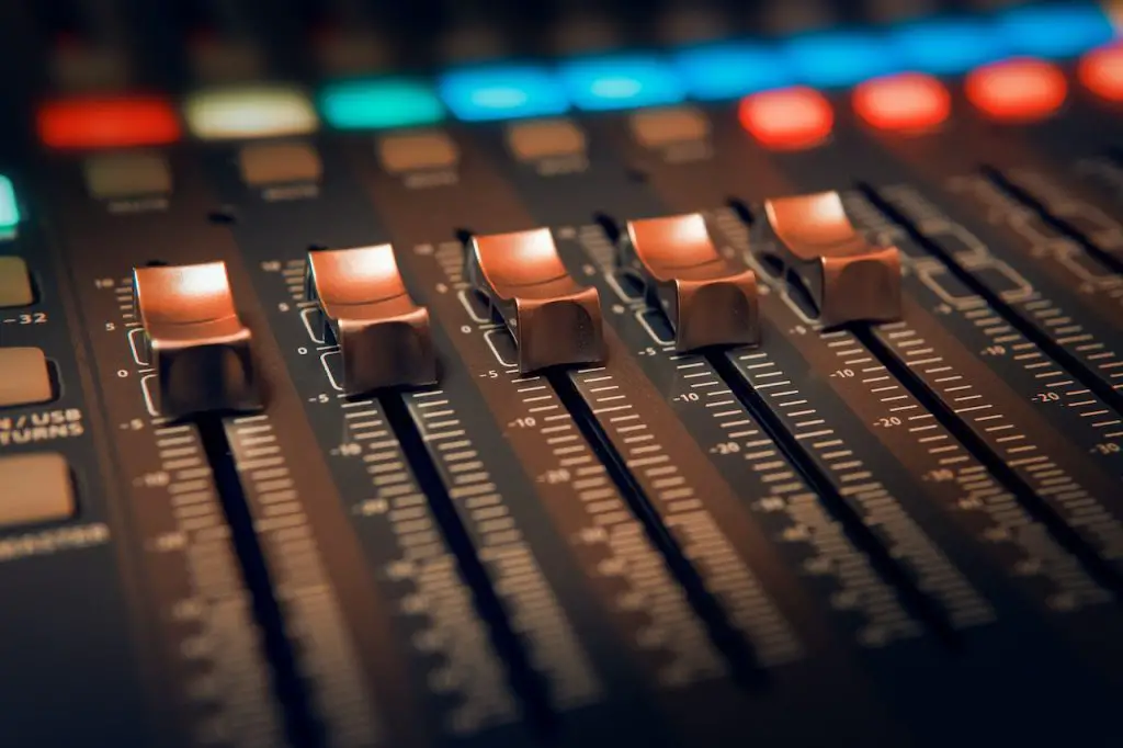 Image of a db level and control panel of an audio mixer. Source: dmitry demidov, pexels