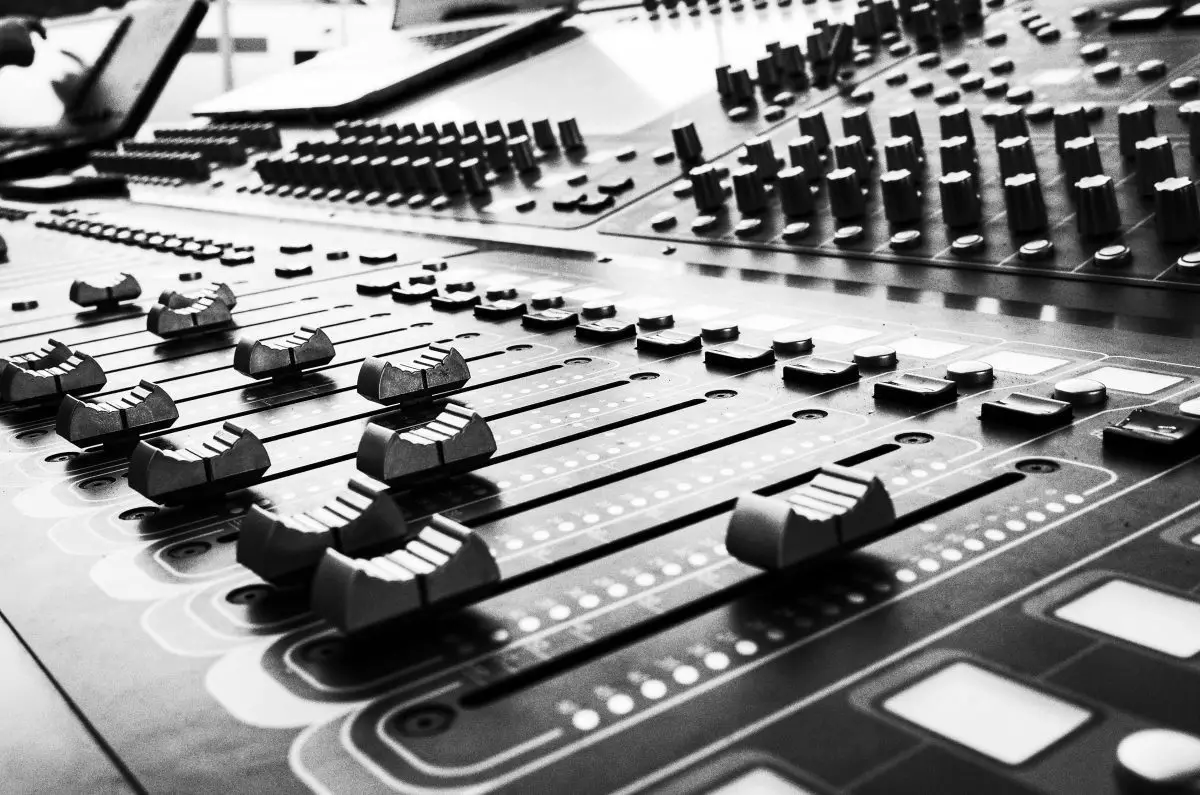 Image of a black and white audio mixer. Source: unsplash