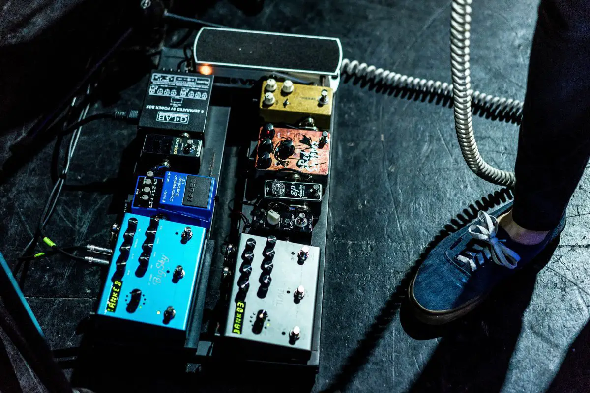 Image of a compressor pedal used by a guitarist. Source: unsplash