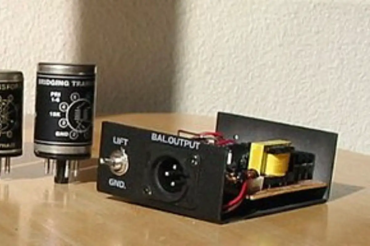 Image of direct injection box the yellow transformer changes a high impedance input to a low impedance output. Source: wiki images