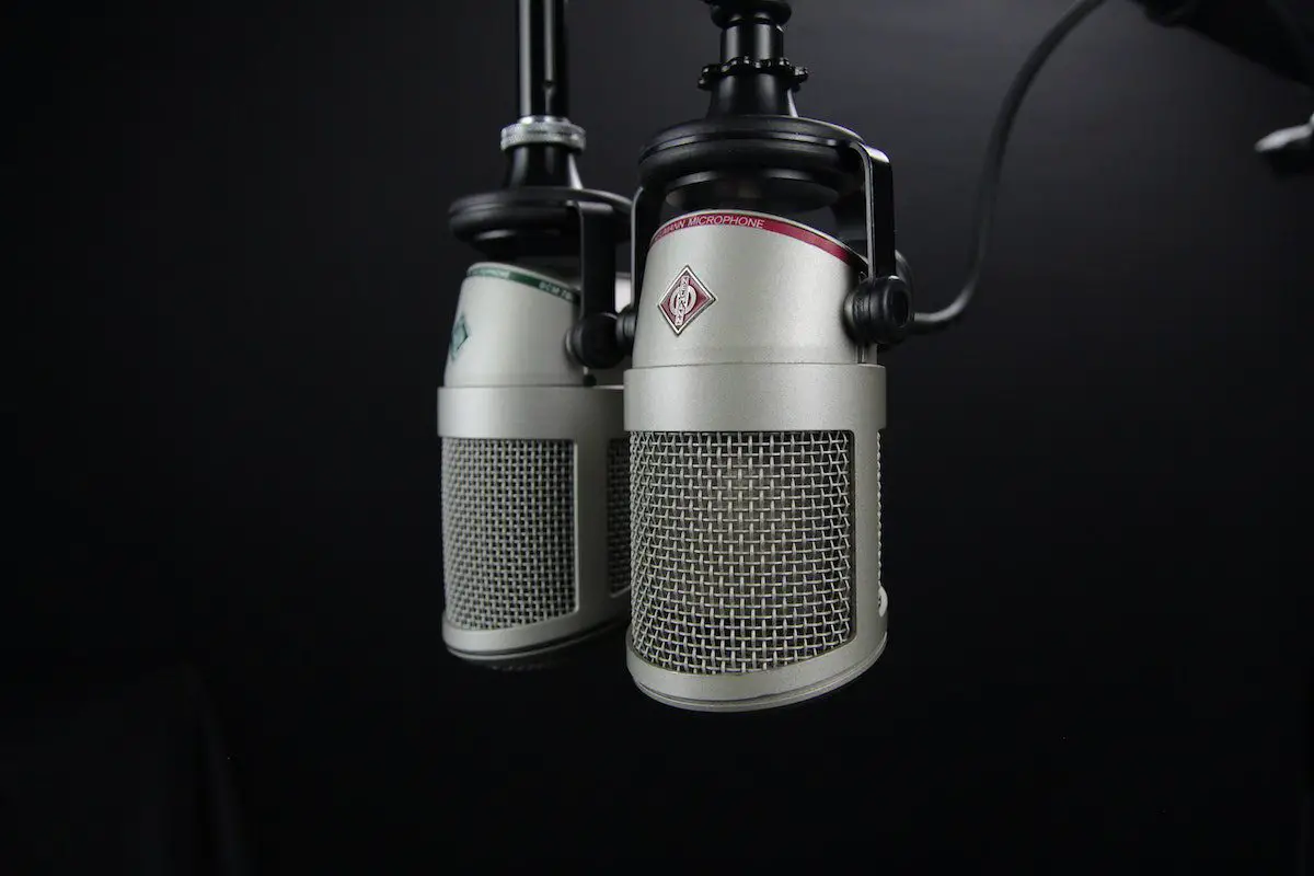 Image of two grey condenser microphones. Source: pexels