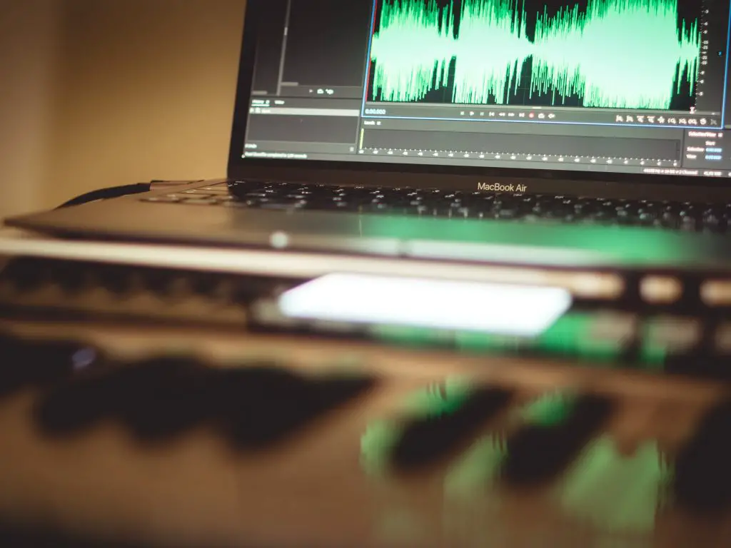 Close-up of an audio editing software in a laptop. Source: unsplash