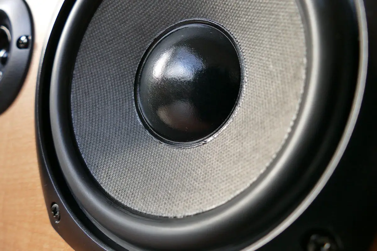 Image of a brown wooden sony speaker. Source: pexels