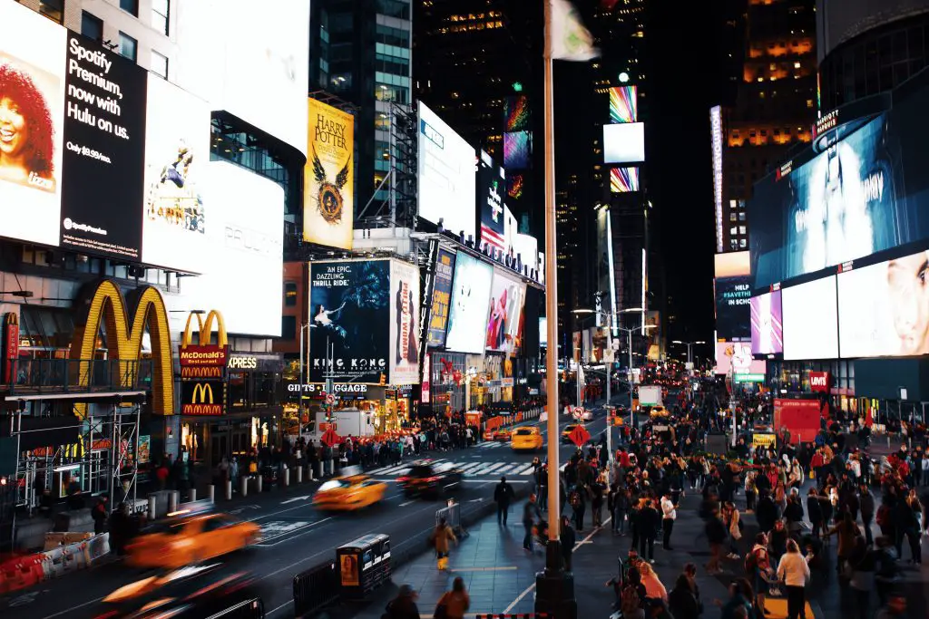 Busy street of new york times square at nighttime. Source: unsplash