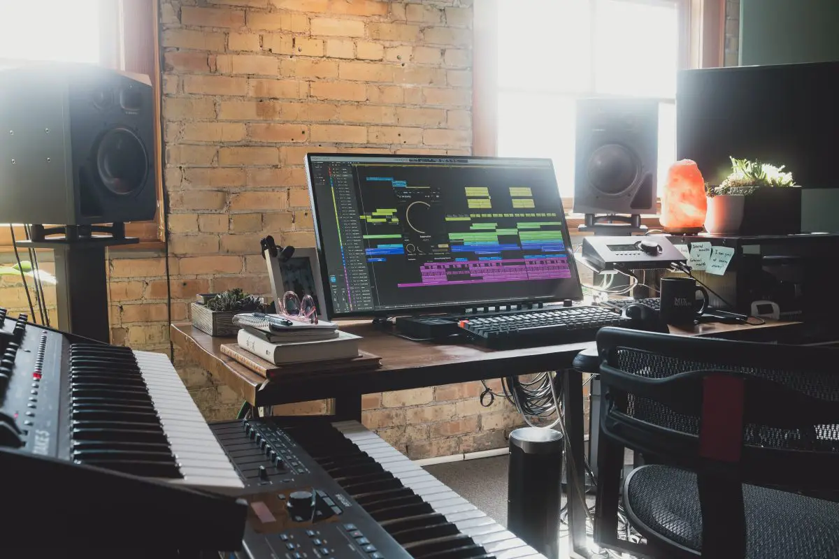 A home recording studio setup with a daw. Source: unsplash