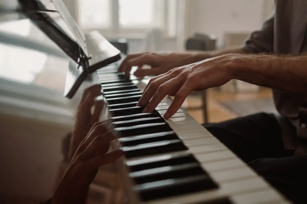 Closeup of a pianist playing. Source: pexels