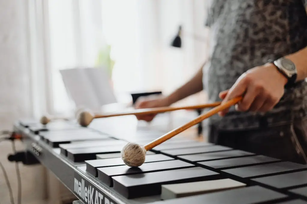 Image of a xylophonist playing the xylophone. Source: pexels