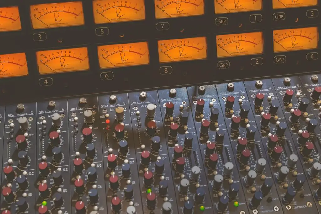 Image of vu meters in a mixing console unsplash