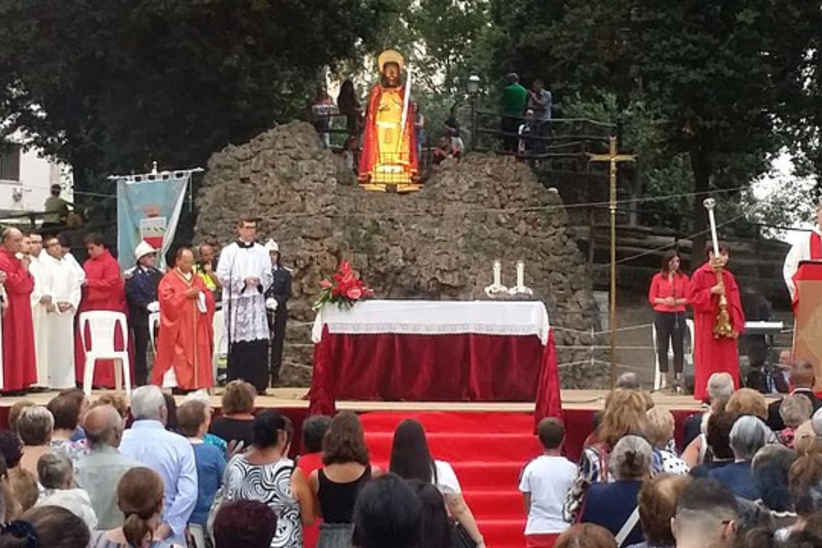 Image of a group of people attending mass together.