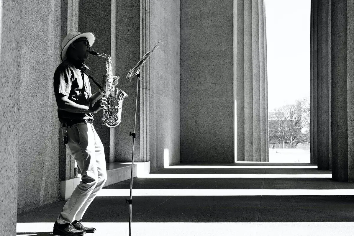 Image of a man improvising on the saxophone. Source: unsplash