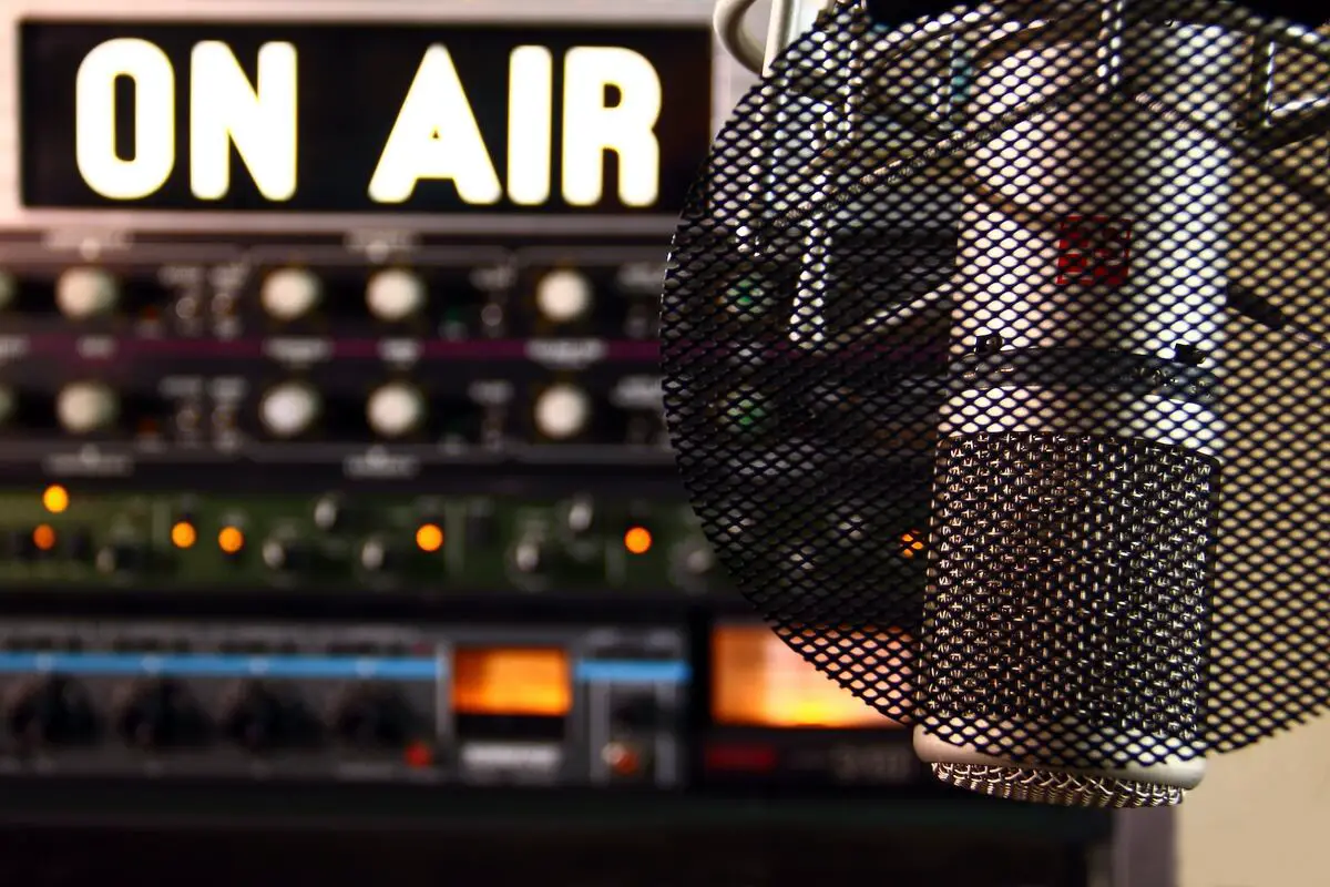 Image of a microphone in a radio station. Source: unsplash