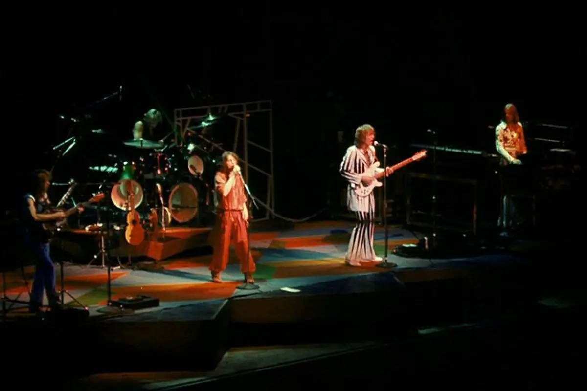 Image of a band performing in a concert.