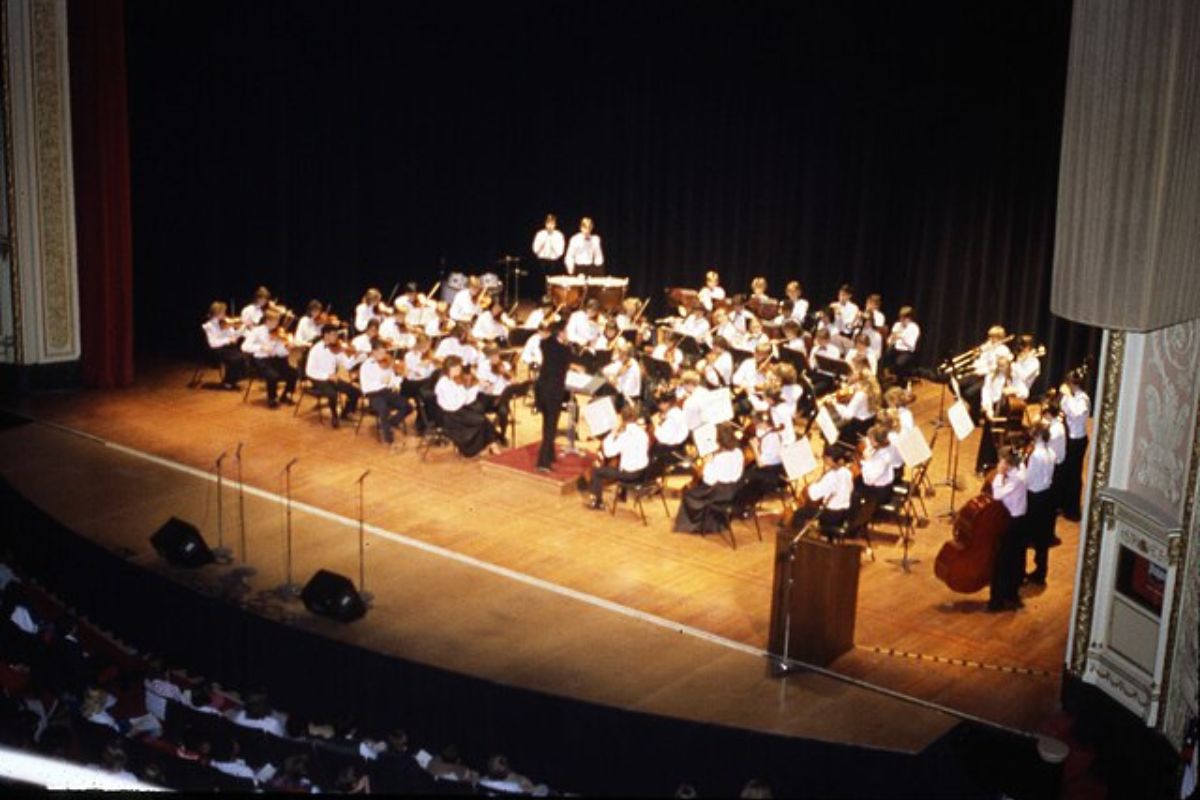 Image of a program symphony performing on stage.