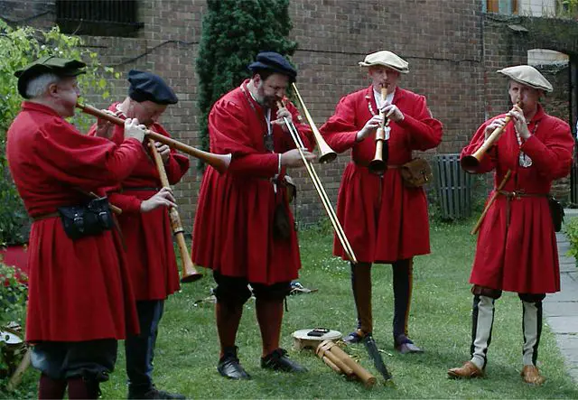 Image of four musicians playing woodwind instruments.