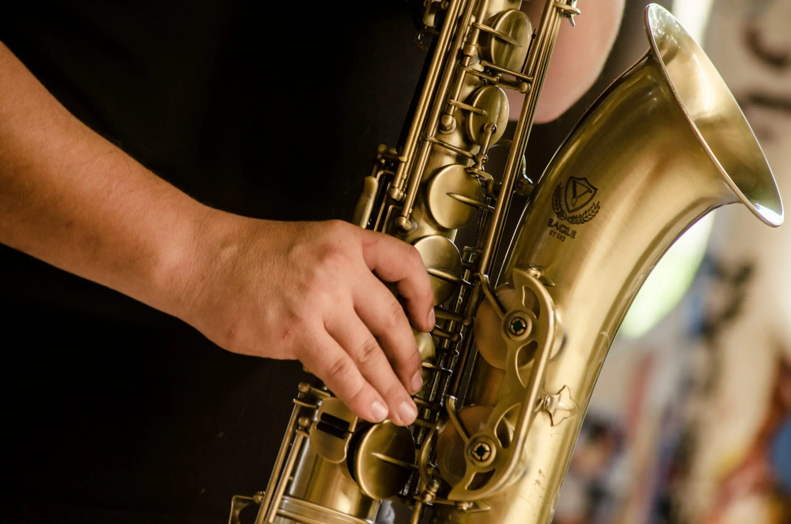 Image of a man playing saxophone